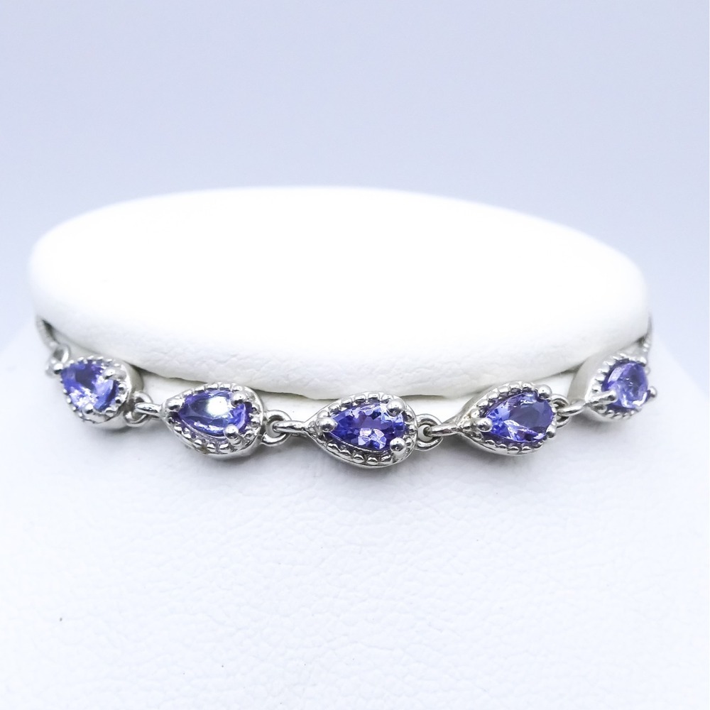 Chuck Clemency Tanzanite bolo slide platinum plated sterling silver .88ctw